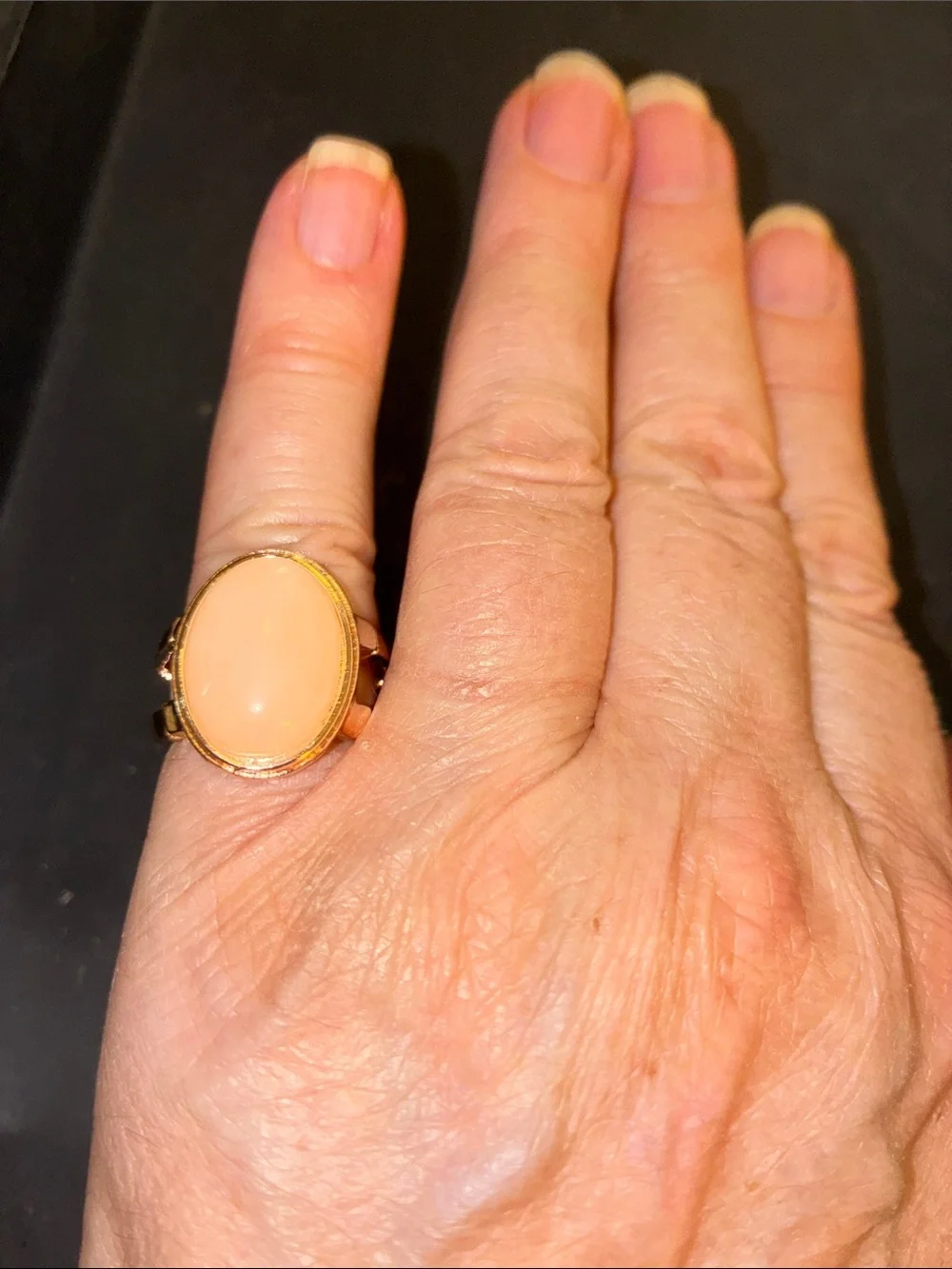 Gold-Tone Stretch Ring with Peach Cabochon Center